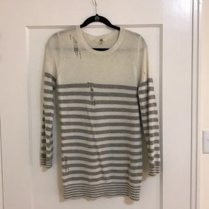 Distressed strip sweater